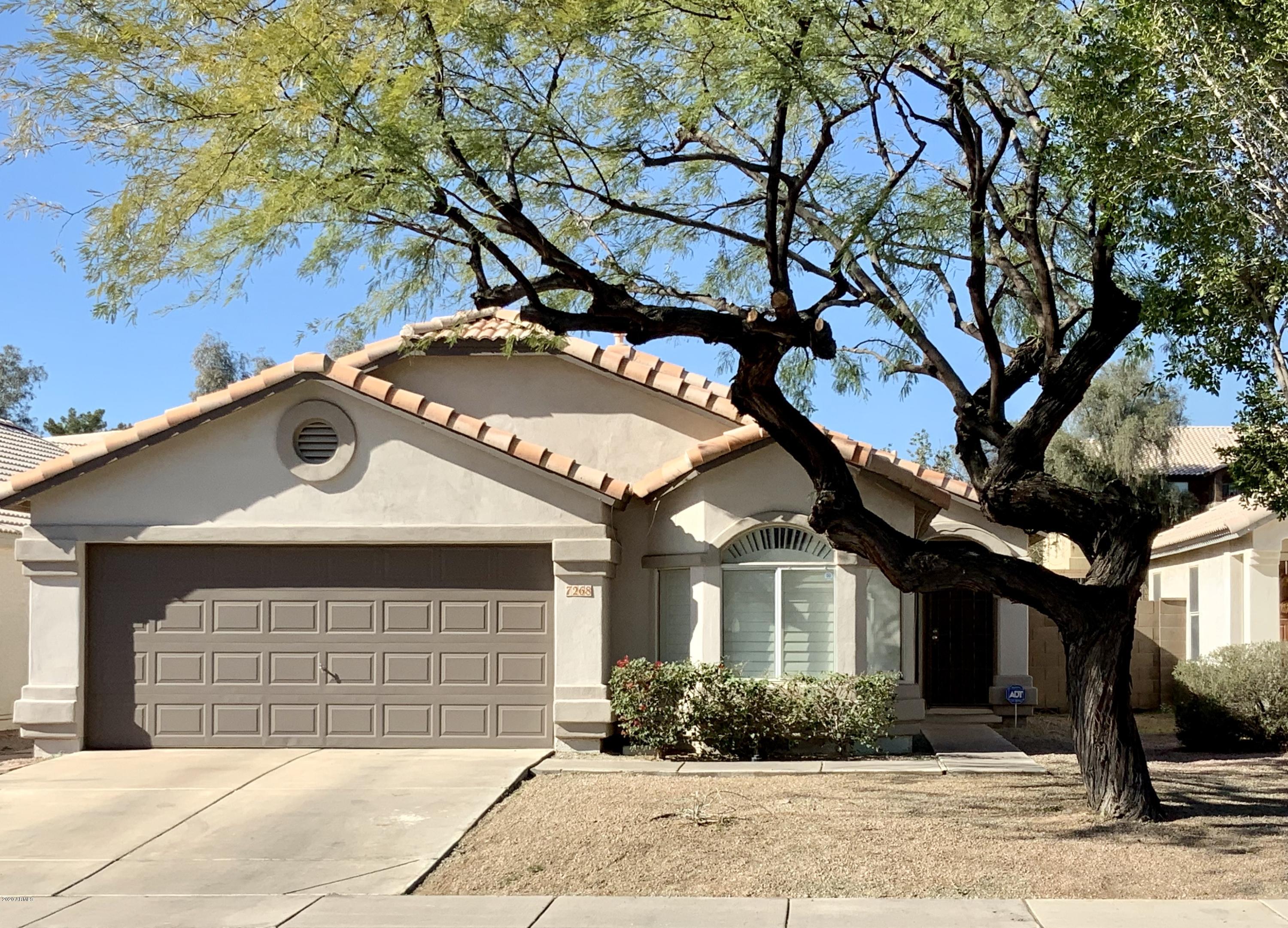 7268 South Roberts Road Tempe, AZ 85283 - Photo 1 of 9 a front view of a house