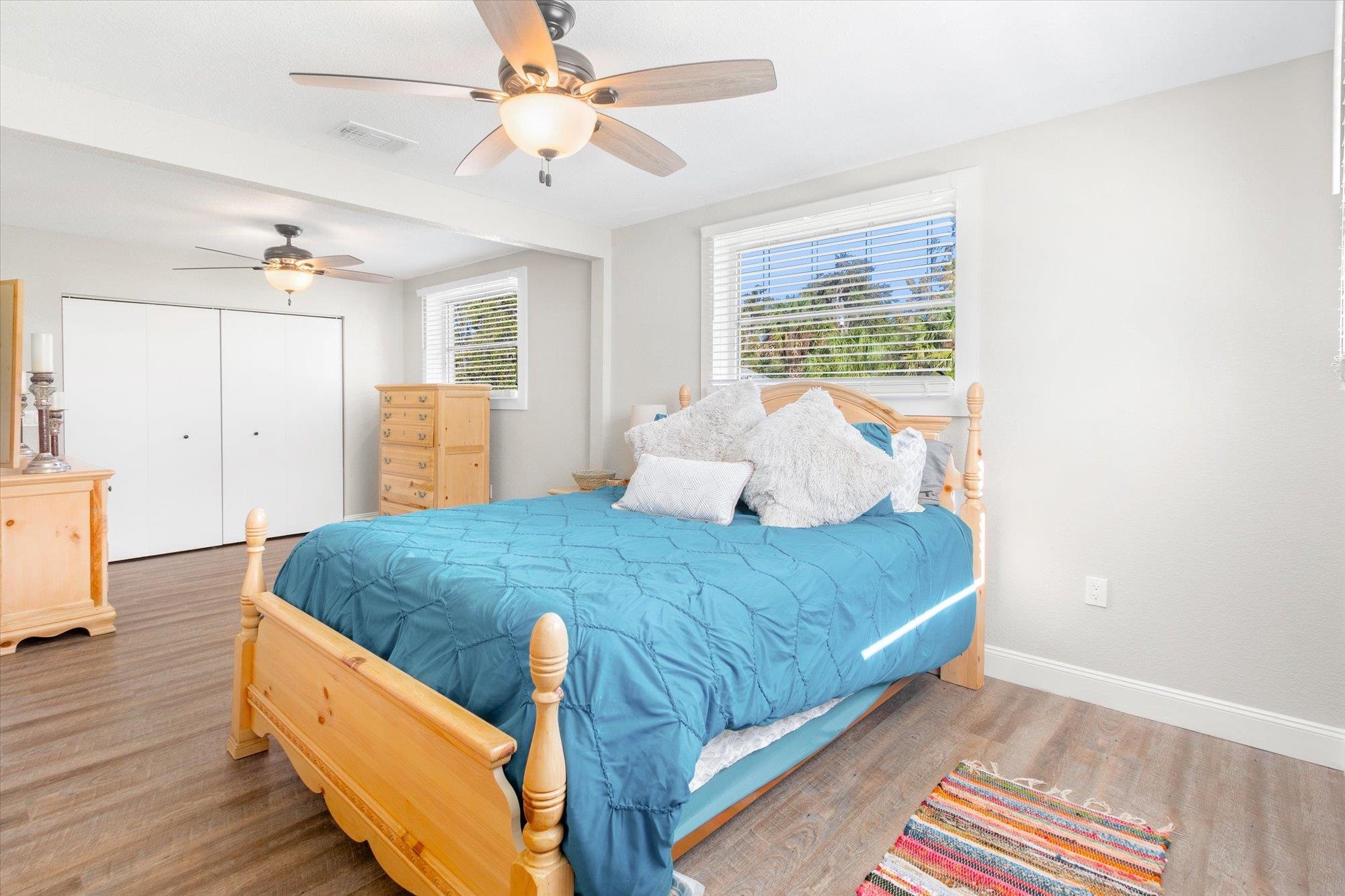 107 Betty Road Crescent City, FL 32112 - Photo 14 of 65 a bed sitting in a bedroom next to a window