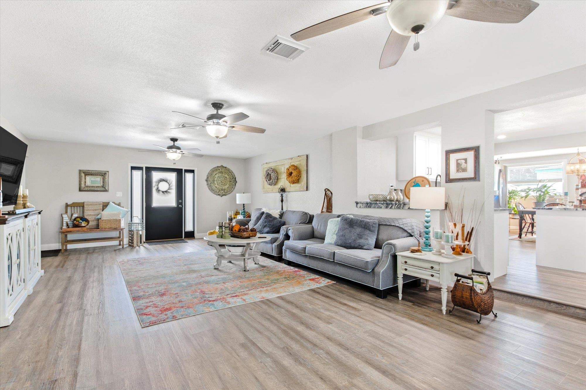 107 Betty Road Crescent City, FL 32112 - Photo 18 of 65 a living room with furniture and a chandelier