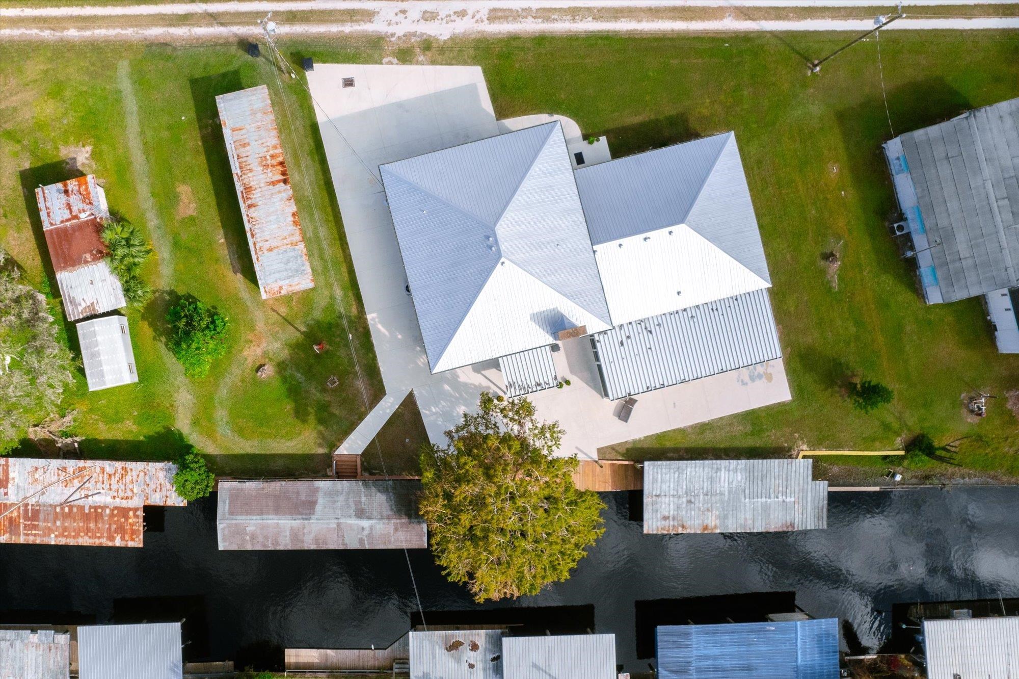 107 Betty Road Crescent City, FL 32112 - Photo 20 of 65 an aerial view of a house with a yard basket ball court and outdoor seating