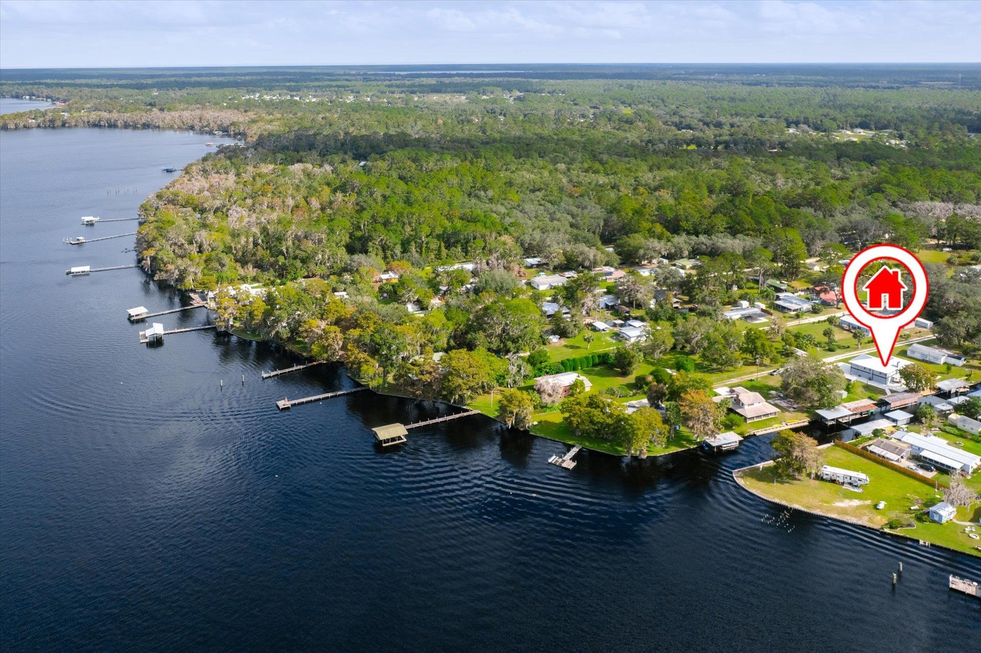 107 Betty Road Crescent City, FL 32112 - Photo 27 of 65 a view of a lake with a mountain in the back