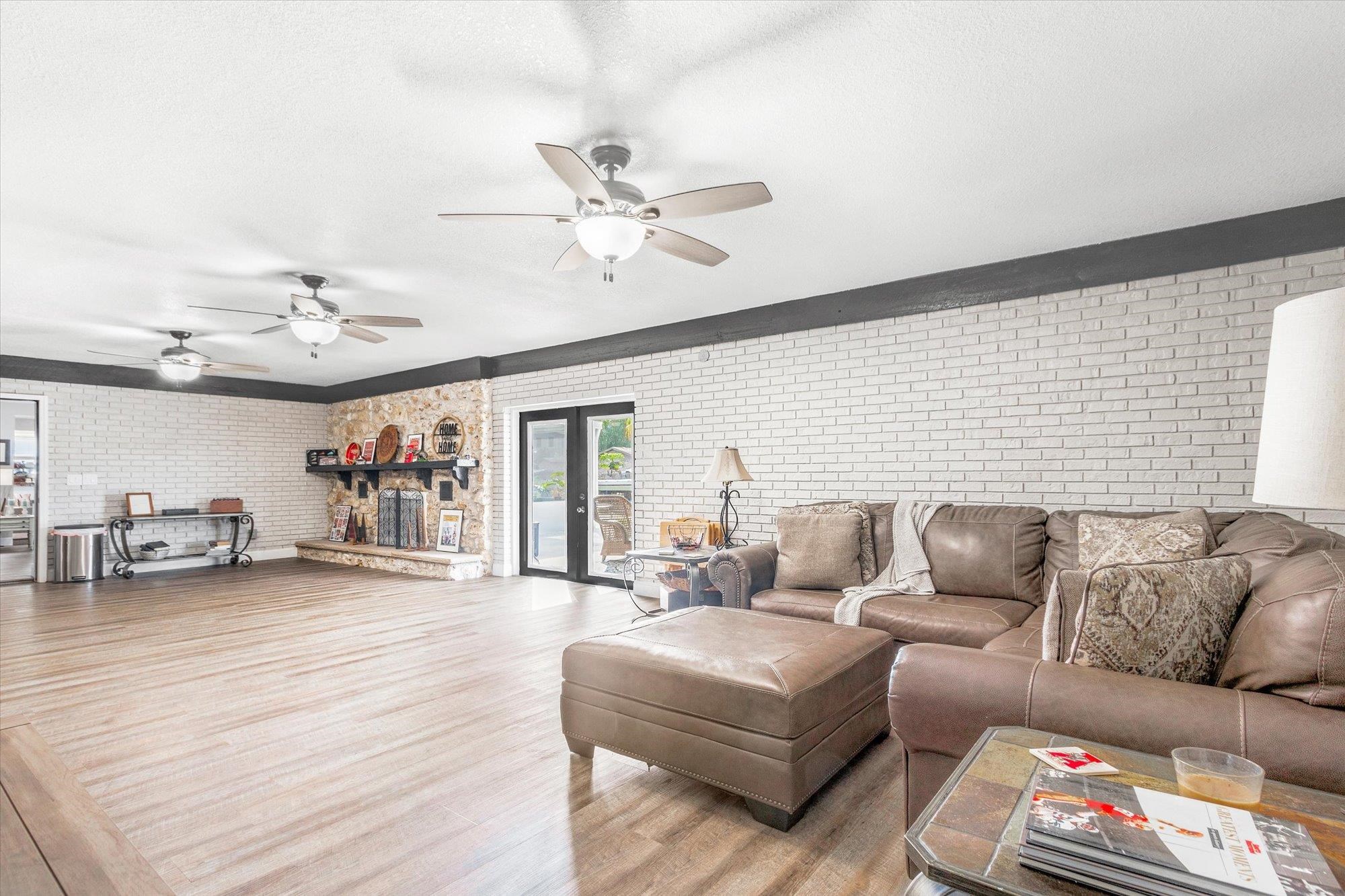 107 Betty Road Crescent City, FL 32112 - Photo 28 of 65 a living room with furniture and a wooden floor