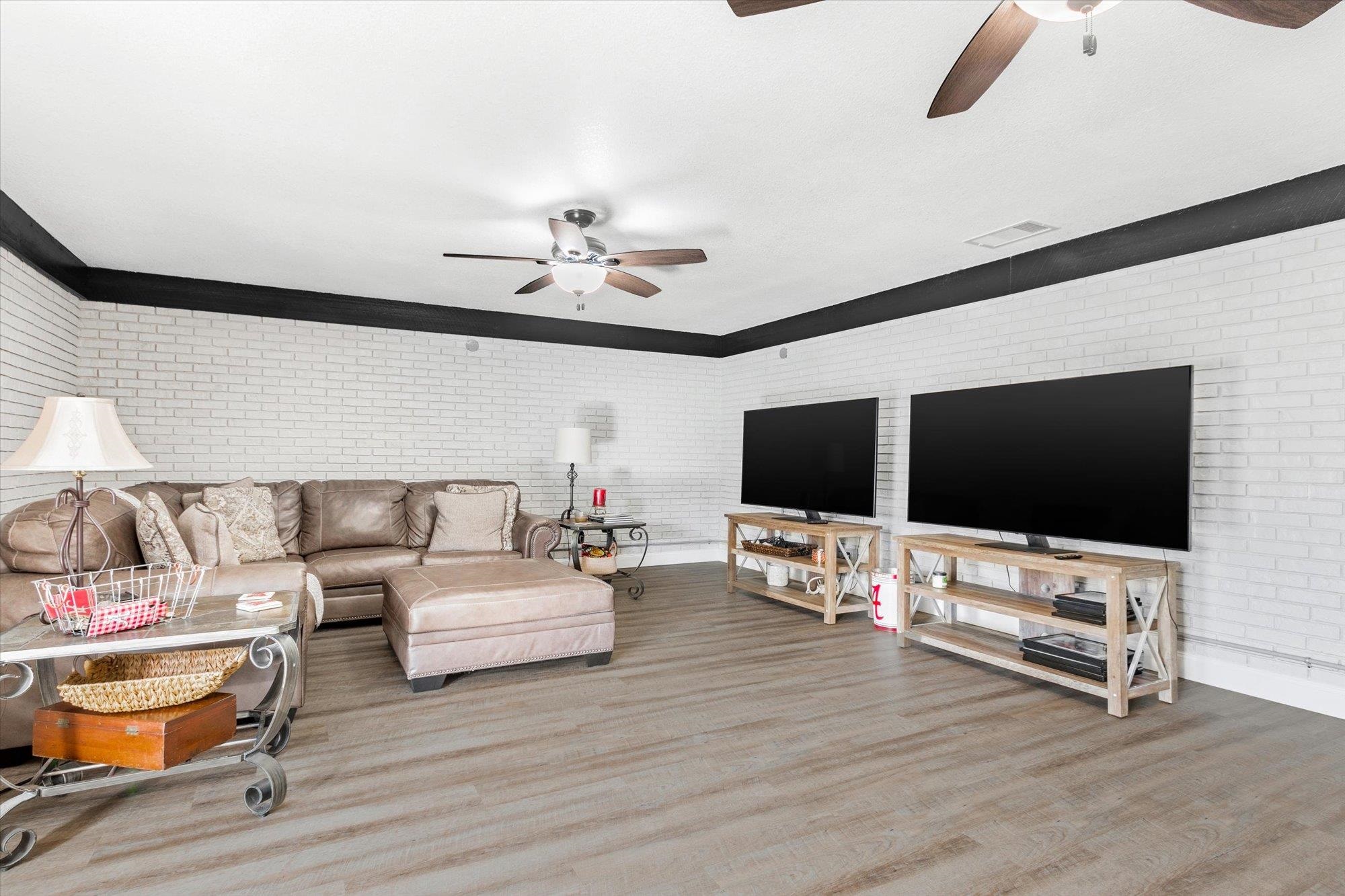 107 Betty Road Crescent City, FL 32112 - Photo 29 of 65 a living room with furniture and a flat screen tv