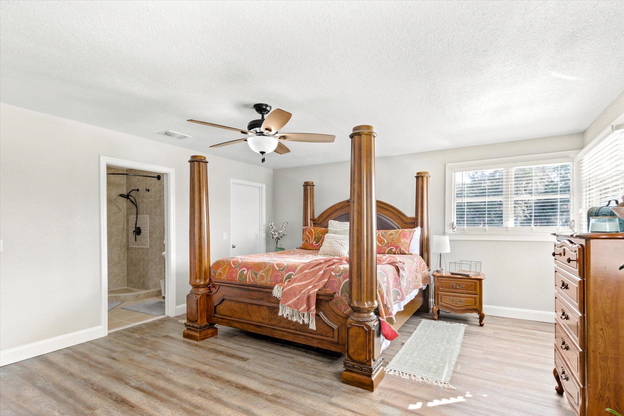 107 Betty Road Crescent City, FL 32112 - Photo 35 of 65 a bedroom with a bed and a large window