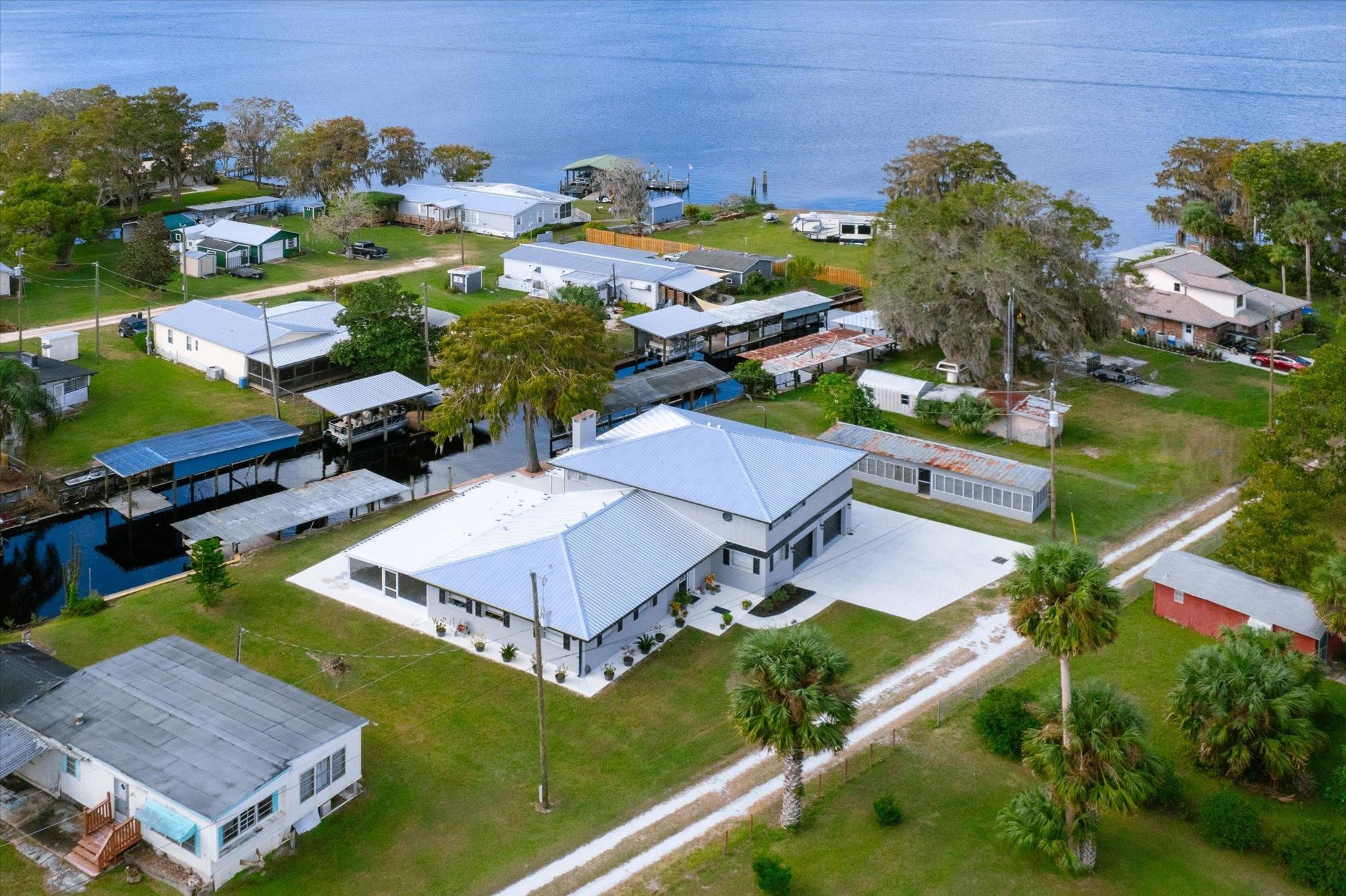107 Betty Road Crescent City, FL 32112 - Photo 48 of 65 an aerial view of a house with garden space and street view