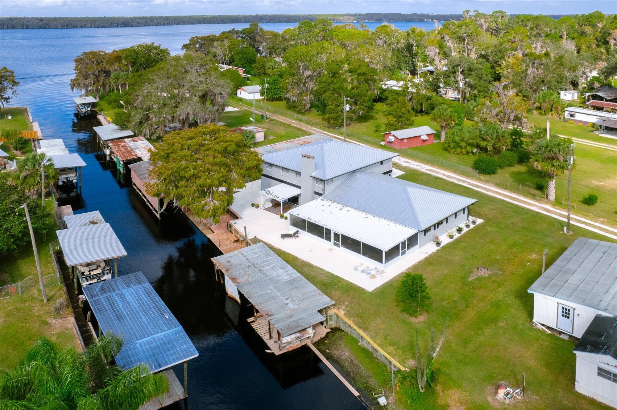 107 Betty Road Crescent City, FL 32112 - Photo 52 of 65 an aerial view of a house with a yard