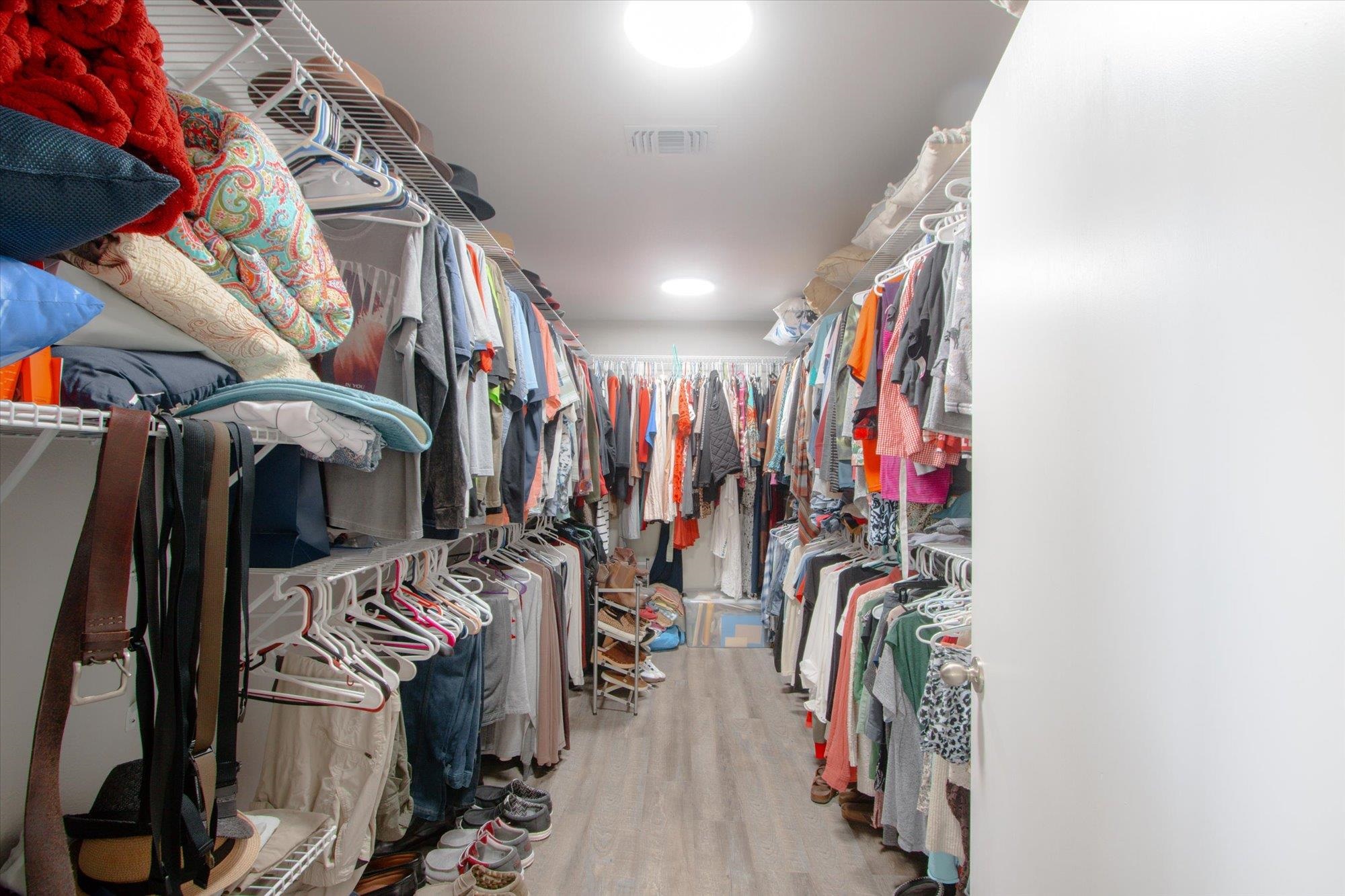 107 Betty Road Crescent City, FL 32112 - Photo 62 of 65 a view of walk in closet with clothes