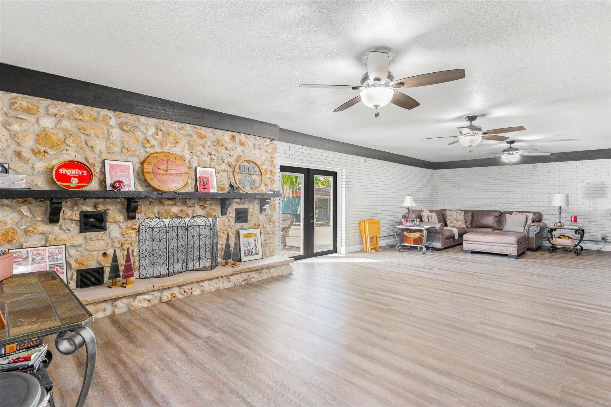 107 Betty Road Crescent City, FL 32112 - Photo 64 of 65 a view of a livingroom with furniture chandelier fan and windows