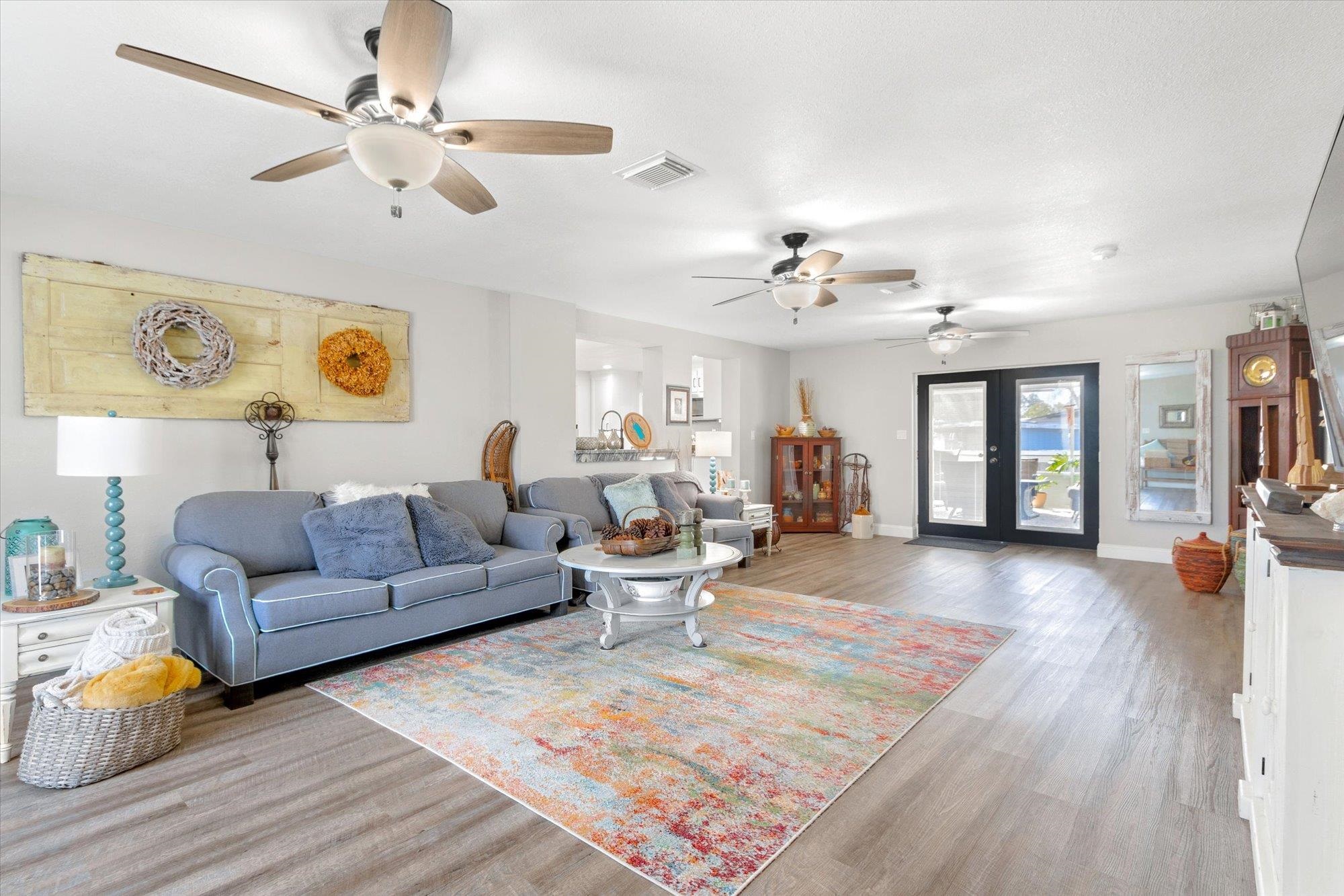 107 Betty Road Crescent City, FL 32112 - Photo 7 of 65 a living room with furniture and wooden floor