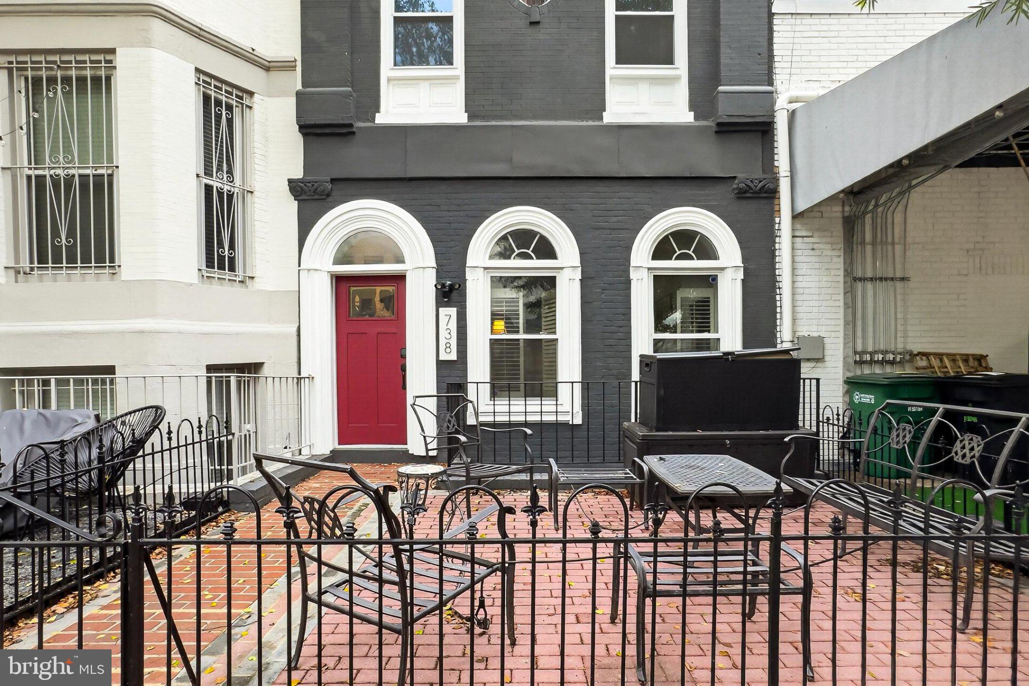738 11th Street Northeast, Unit 3 Washington, DC 20002 - Photo 3 of 29 Charming urban retreat with a red door.