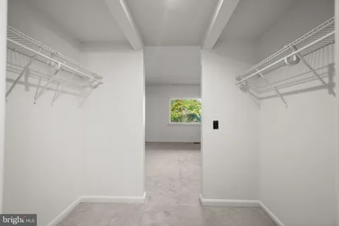 a view of an empty walk in closet