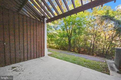 a view of backyard with green space