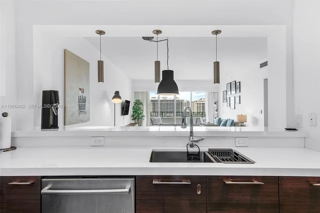 a kitchen with a sink and a window