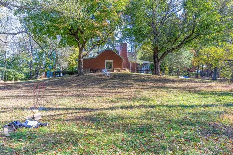 a view of the space of a house with a trees