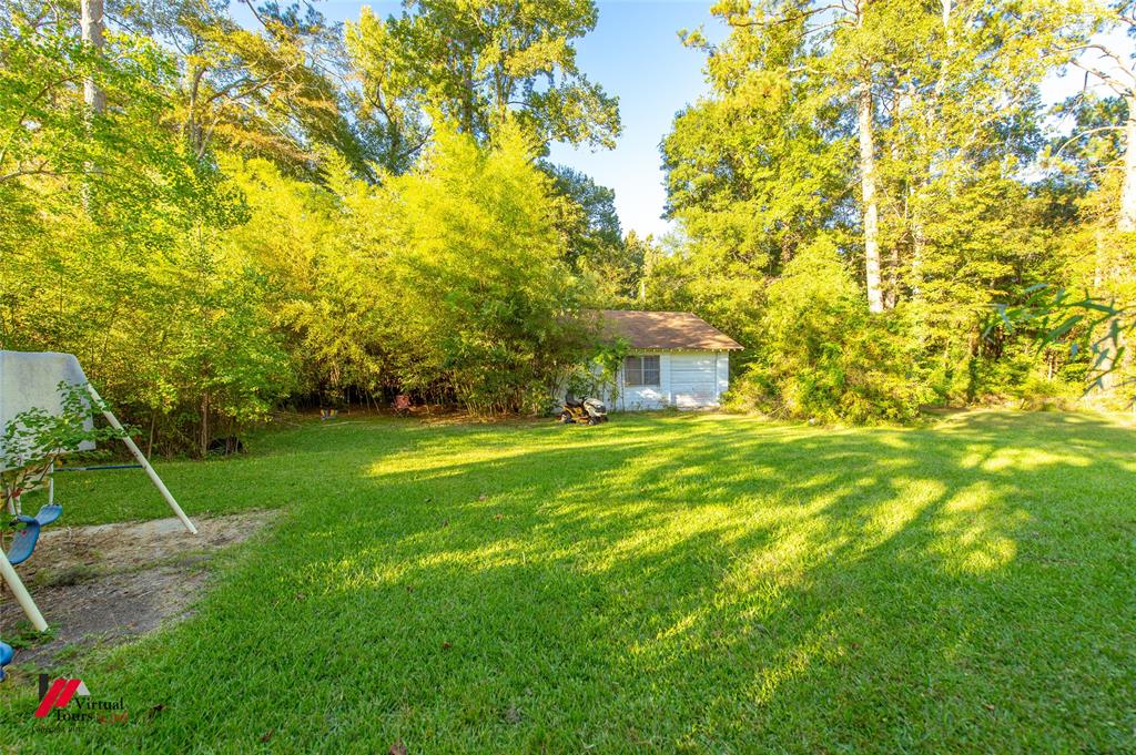 206 North Street Springhill, LA 71075 - Photo 3 of 28 a view of house with a backyard