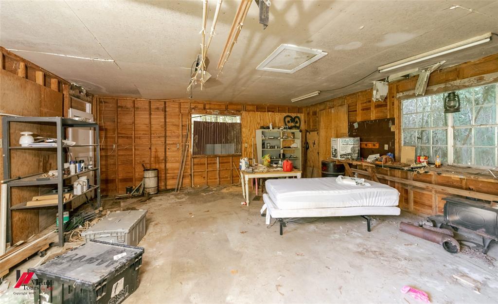 206 North Street Springhill, LA 71075 - Photo 5 of 28 a room with pool table and glass windows