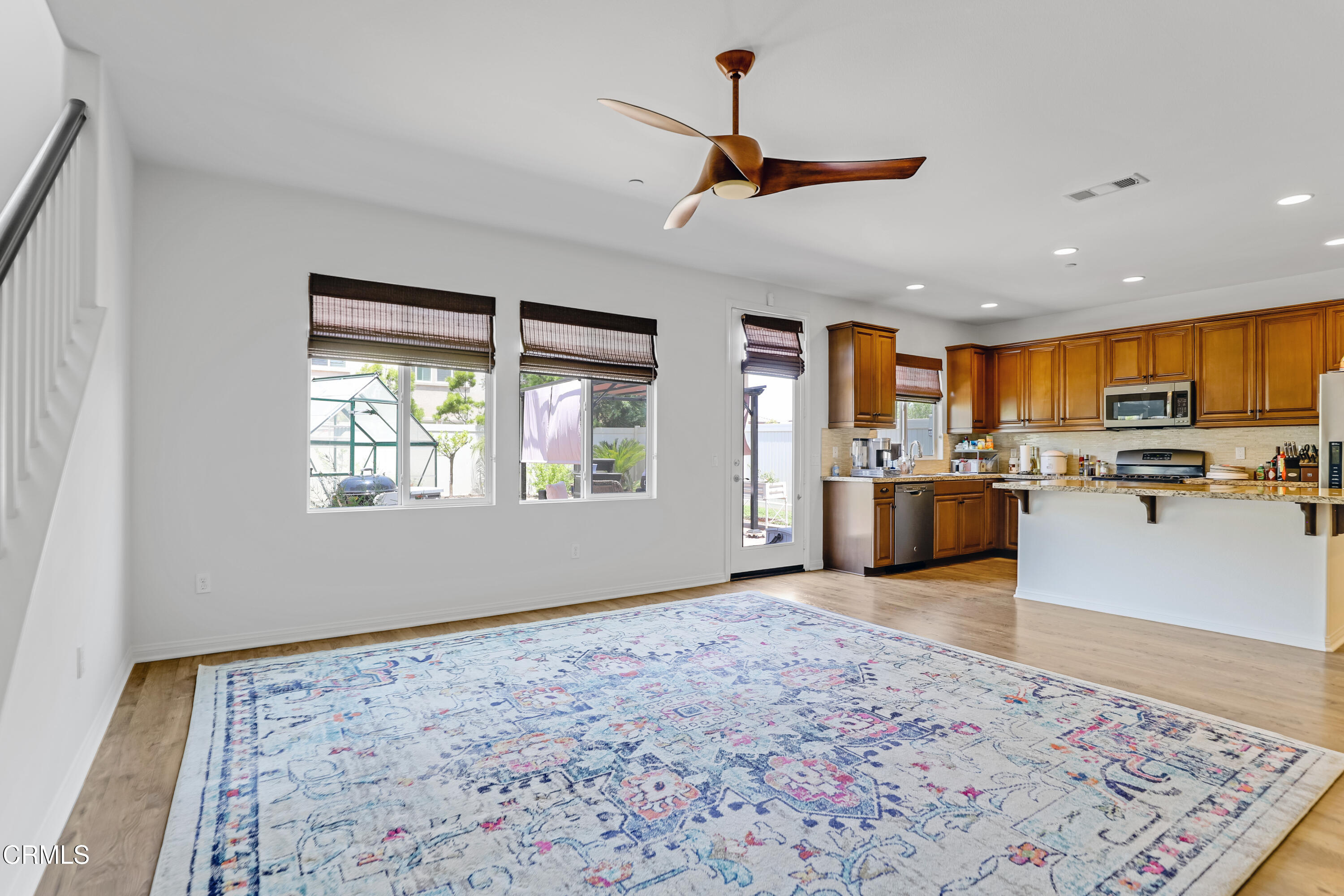 665 Tiber River Way Oxnard, CA 93036 - Photo 15 of 27 a view of a kitchen with furniture wooden floor and a window