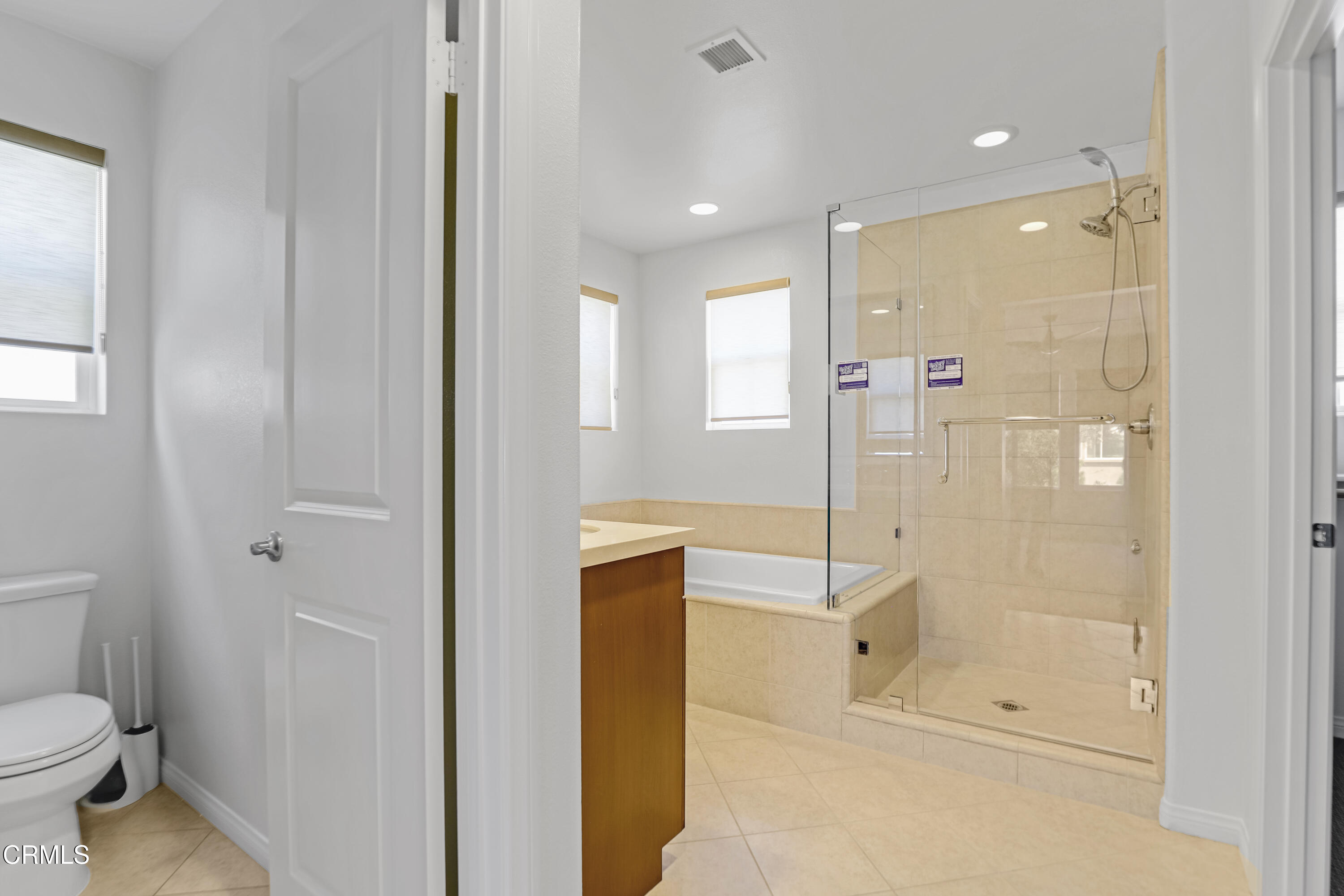 665 Tiber River Way Oxnard, CA 93036 - Photo 21 of 27 a bathroom with a shower and toilet
