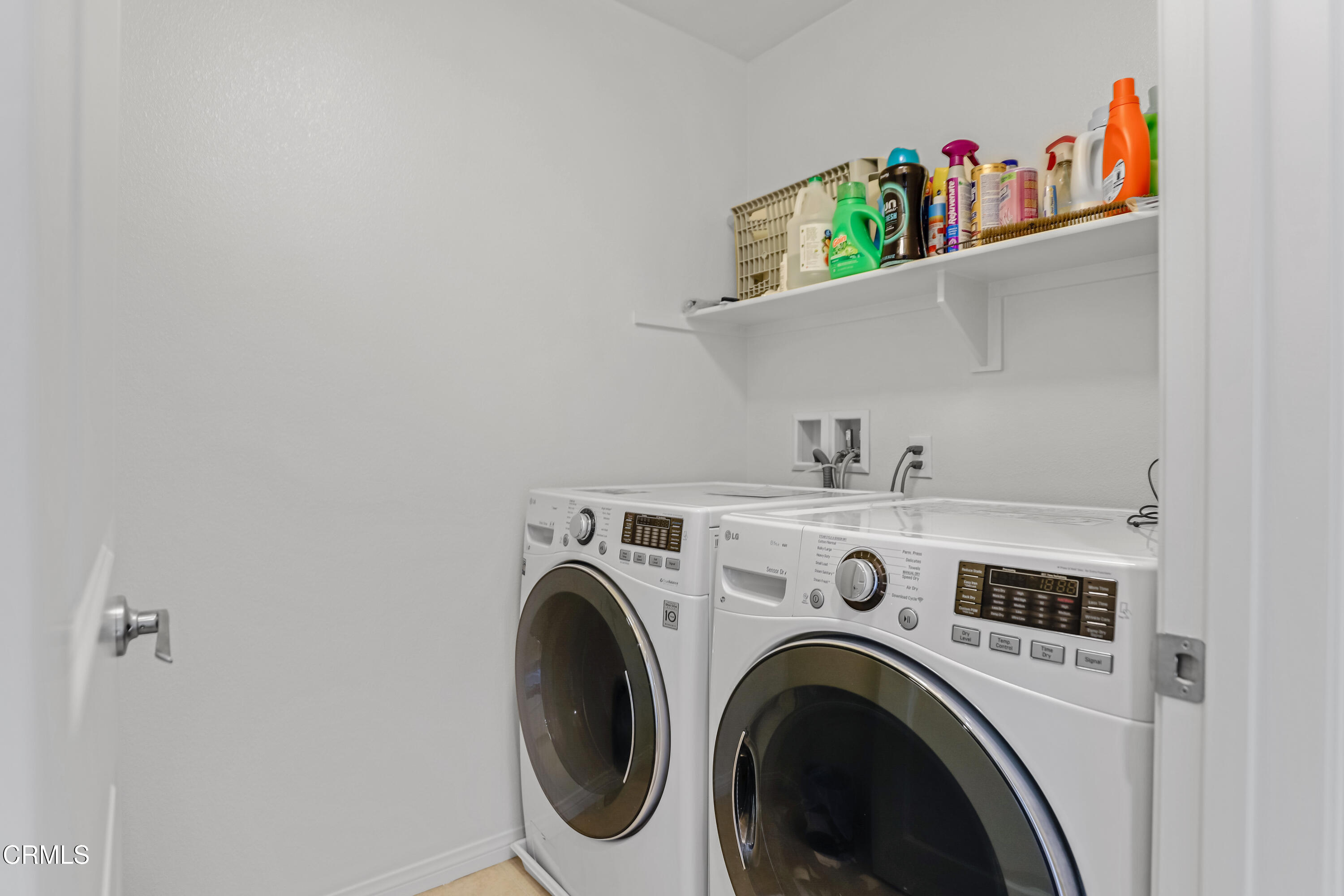 665 Tiber River Way Oxnard, CA 93036 - Photo 24 of 27 a utility room with dryer and washer