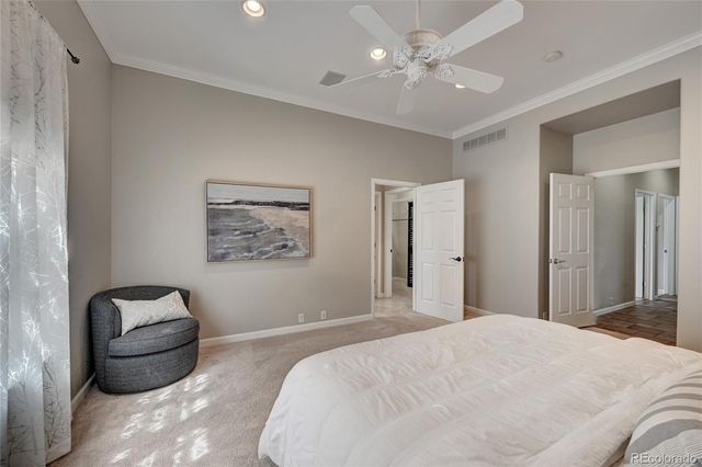 a bathroom with a granite countertop sink mirror and shower