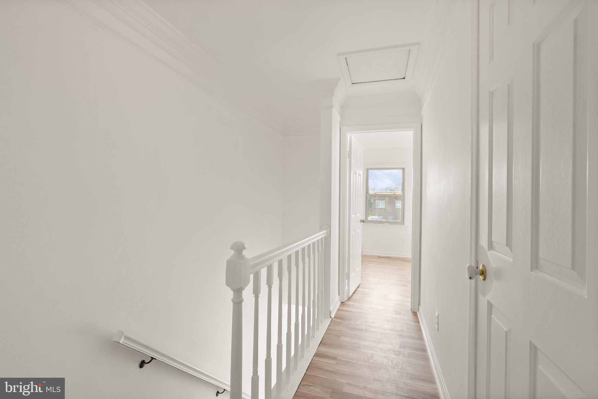 3733 Roxbury Lane Alexandria, VA 22309 - Photo 11 of 37 a view of a hallway with a wooden floor