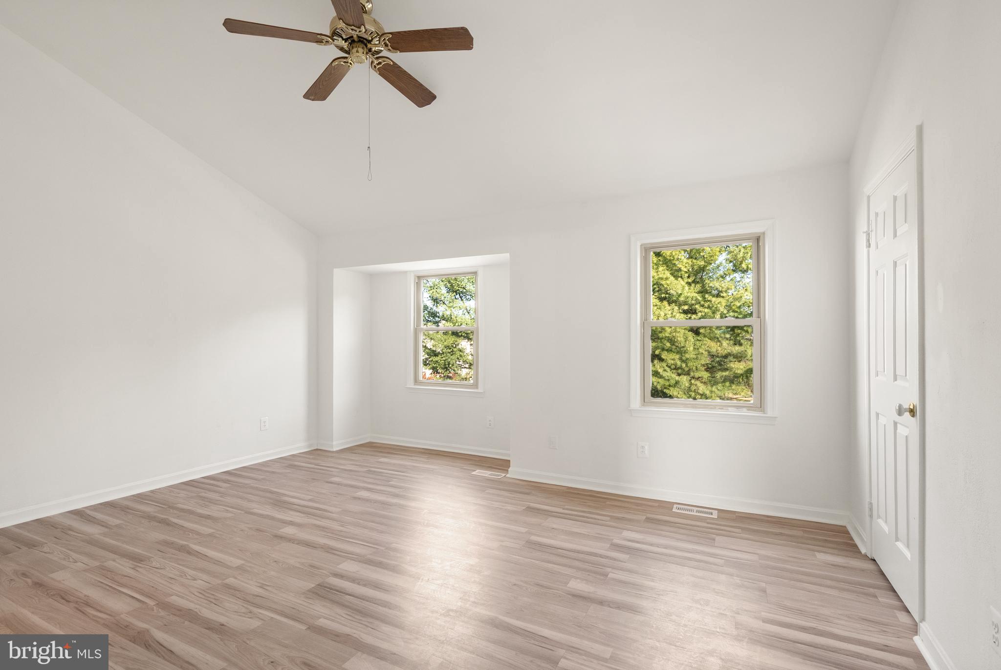 3733 Roxbury Lane Alexandria, VA 22309 - Photo 12 of 37 wooden floor in an empty room with a window