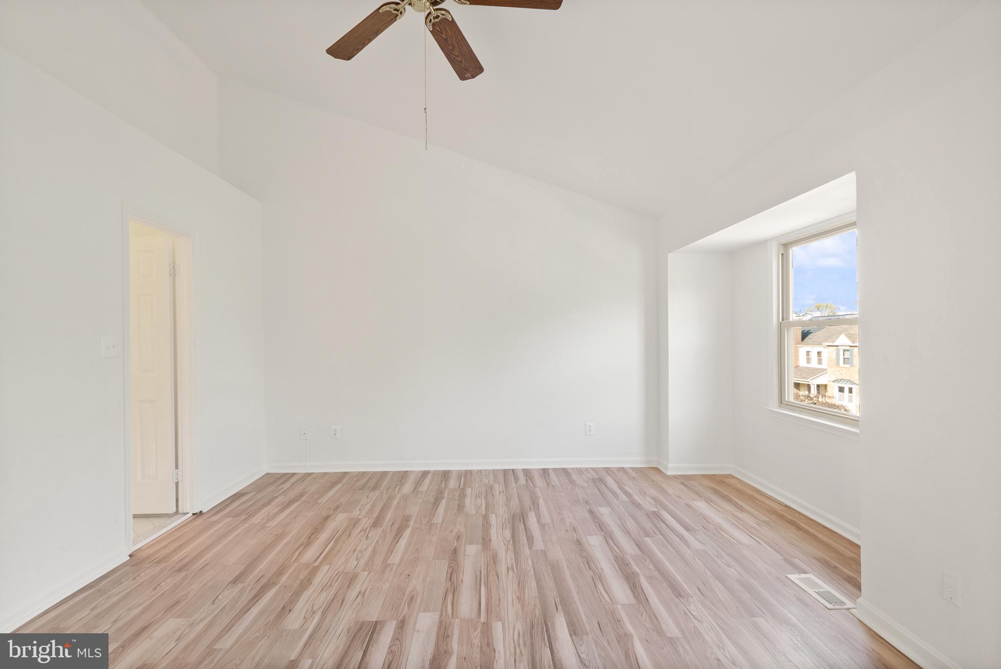 3733 Roxbury Lane Alexandria, VA 22309 - Photo 13 of 37 a view of a room with wooden floor ceiling fan