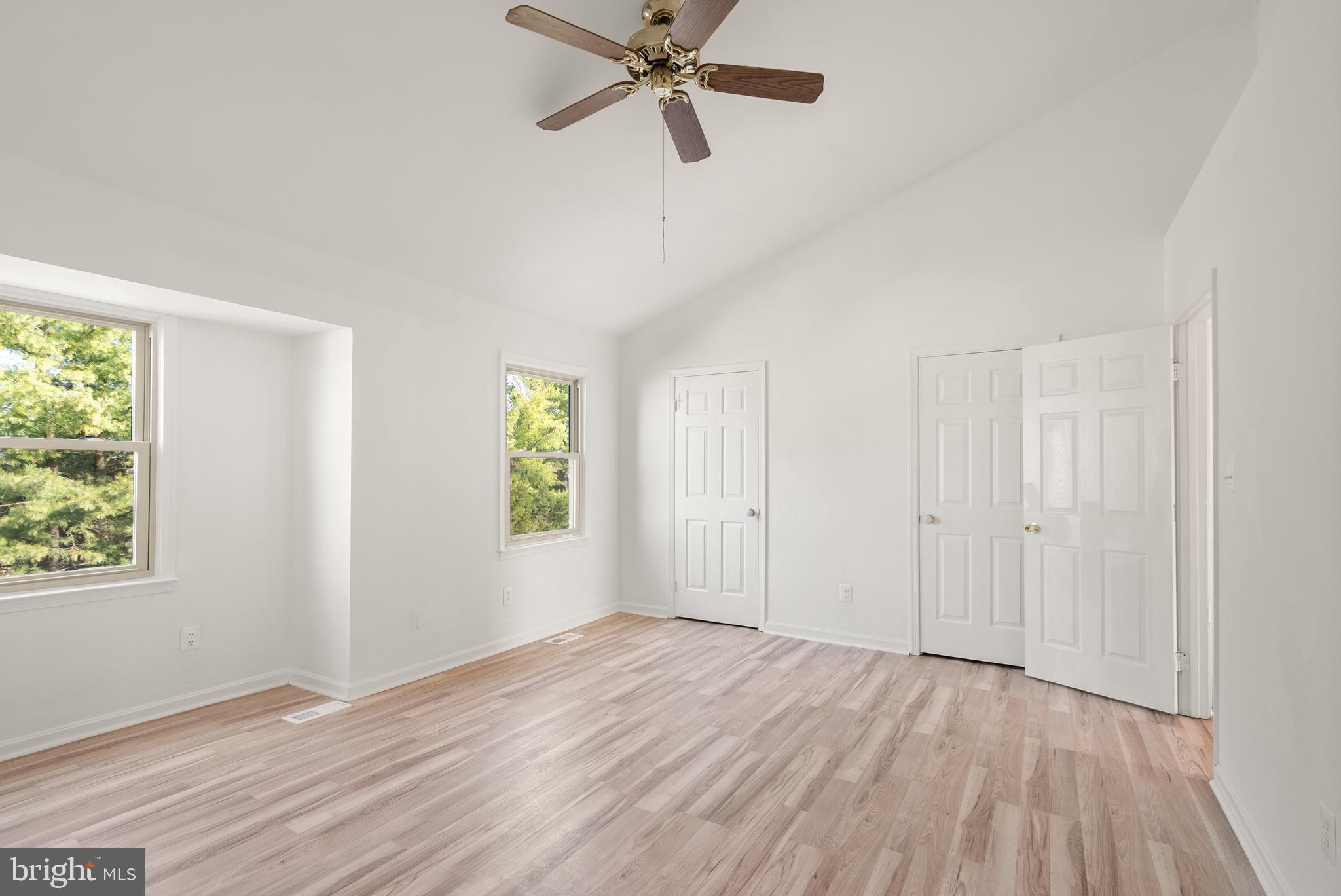 3733 Roxbury Lane Alexandria, VA 22309 - Photo 14 of 37 wooden floor in an empty room with a window