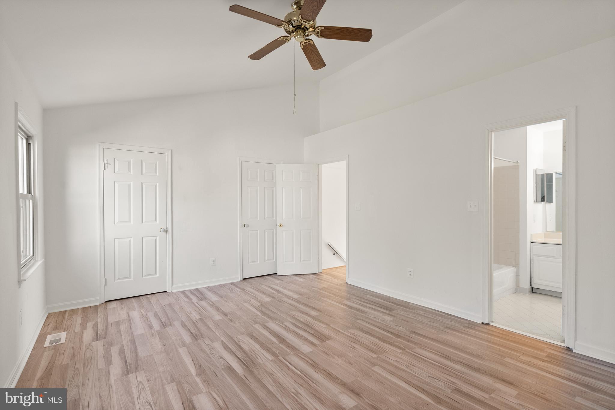 3733 Roxbury Lane Alexandria, VA 22309 - Photo 15 of 37 a view of a room with wooden floor and a ceiling fan