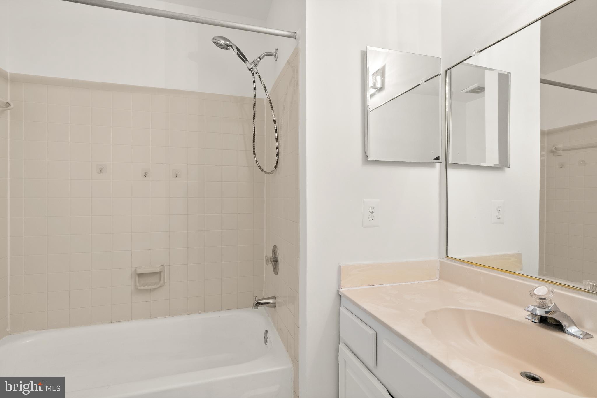 3733 Roxbury Lane Alexandria, VA 22309 - Photo 16 of 37 a bathroom with a sink and a mirror