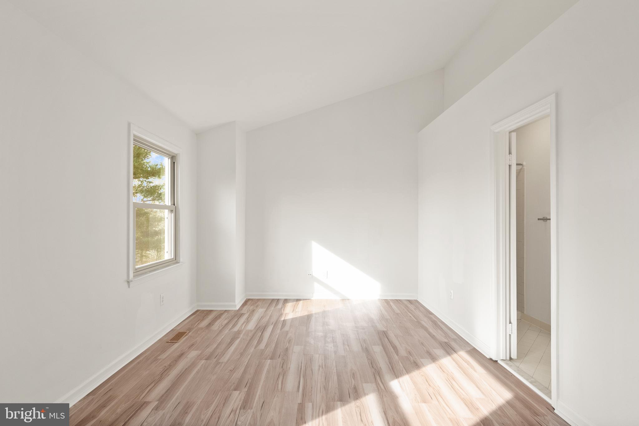 3733 Roxbury Lane Alexandria, VA 22309 - Photo 18 of 37 a view of empty room with wooden floor and fan