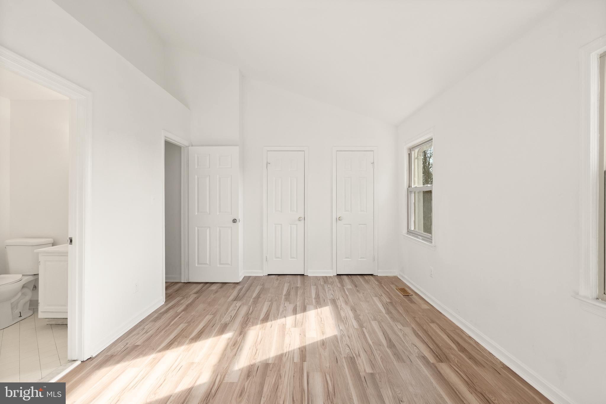 3733 Roxbury Lane Alexandria, VA 22309 - Photo 20 of 37 a view of a room with wooden floor and a window