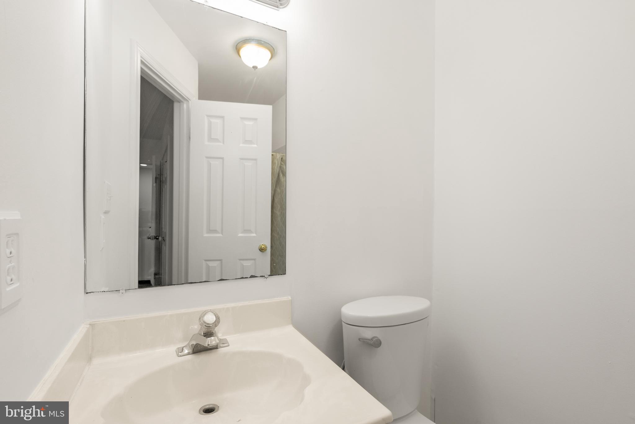 3733 Roxbury Lane Alexandria, VA 22309 - Photo 27 of 37 a bathroom with a sink and a toilet