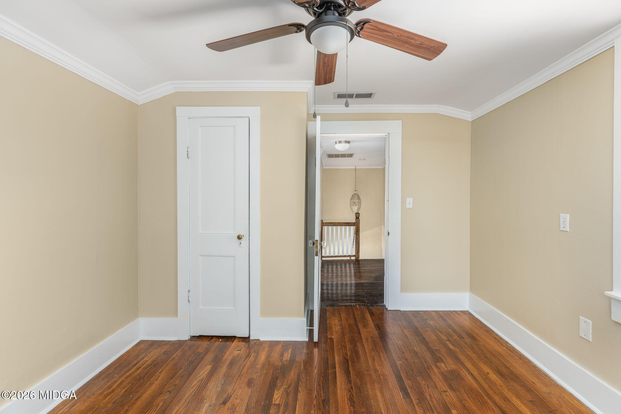 107 Childs Street Gray, GA 31032 - Photo 23 of 37 wooden floor in an empty room with a window
