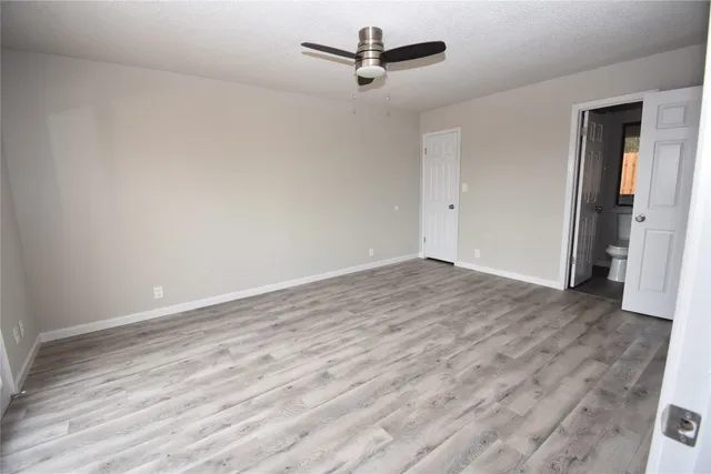 a kitchen with a stove a sink and a refrigerator