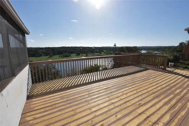 a view of a lake with a city