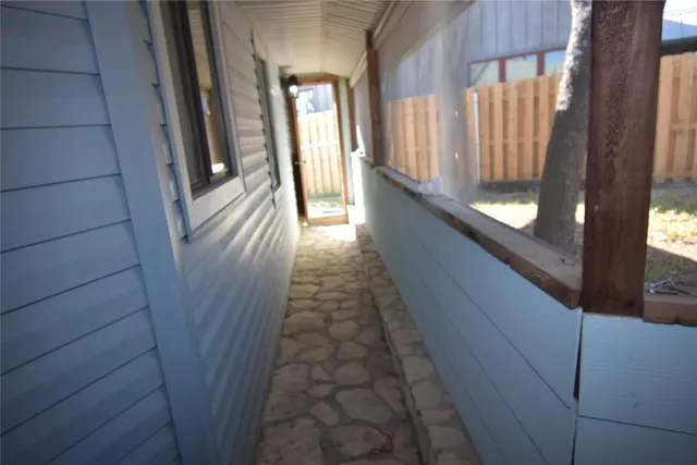 a balcony with wooden floor
