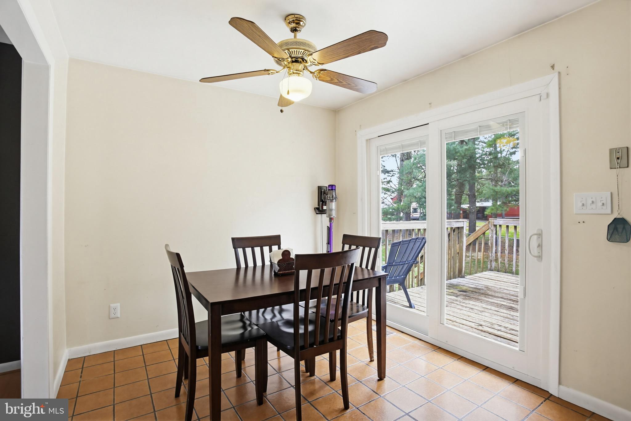 3703 Altondale Road Reisterstown, MD 21136 - Photo 12 of 34 a view of a dining room with furniture window and outside view