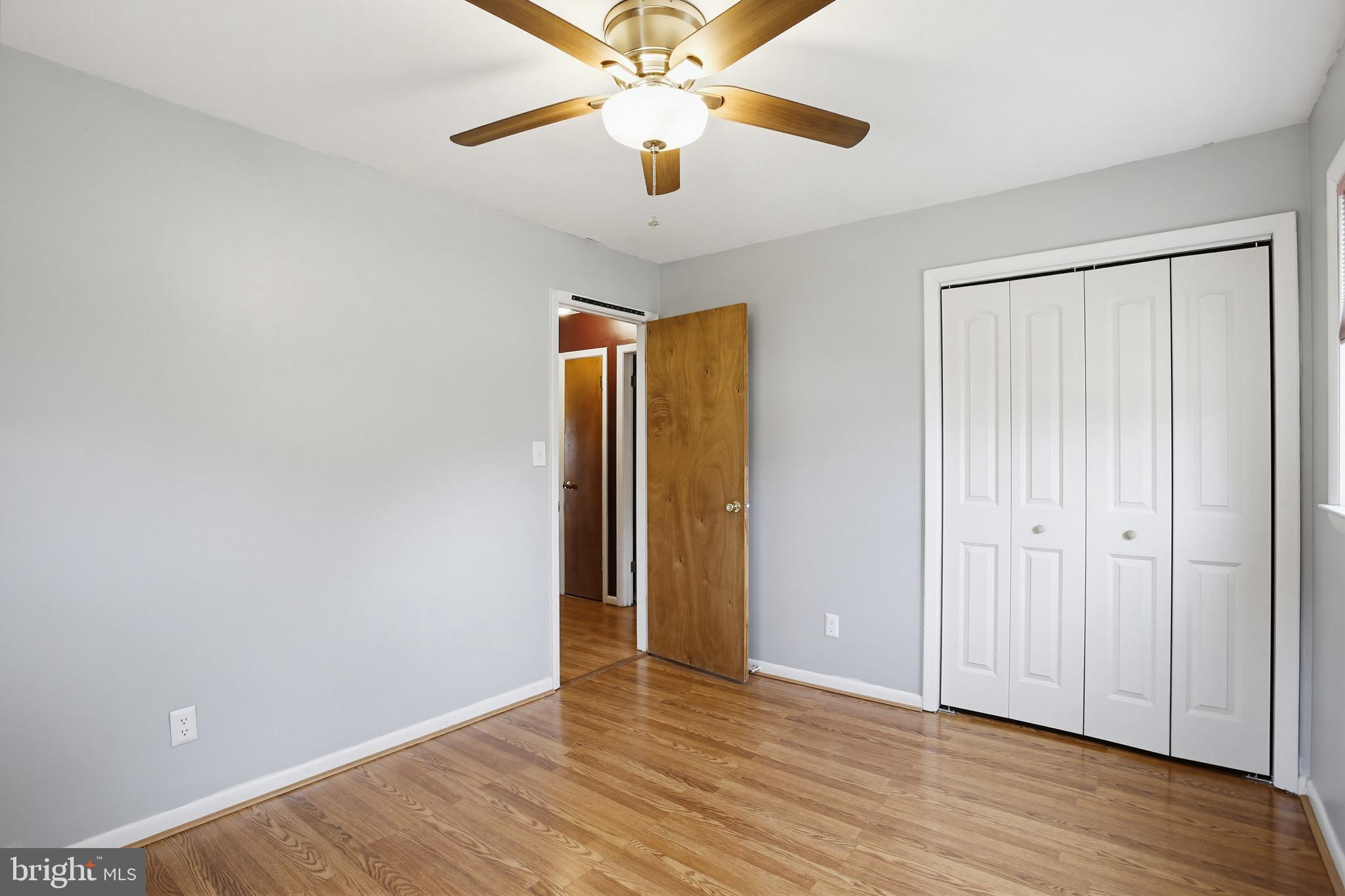 3703 Altondale Road Reisterstown, MD 21136 - Photo 19 of 34 a view of an empty room with wooden floor