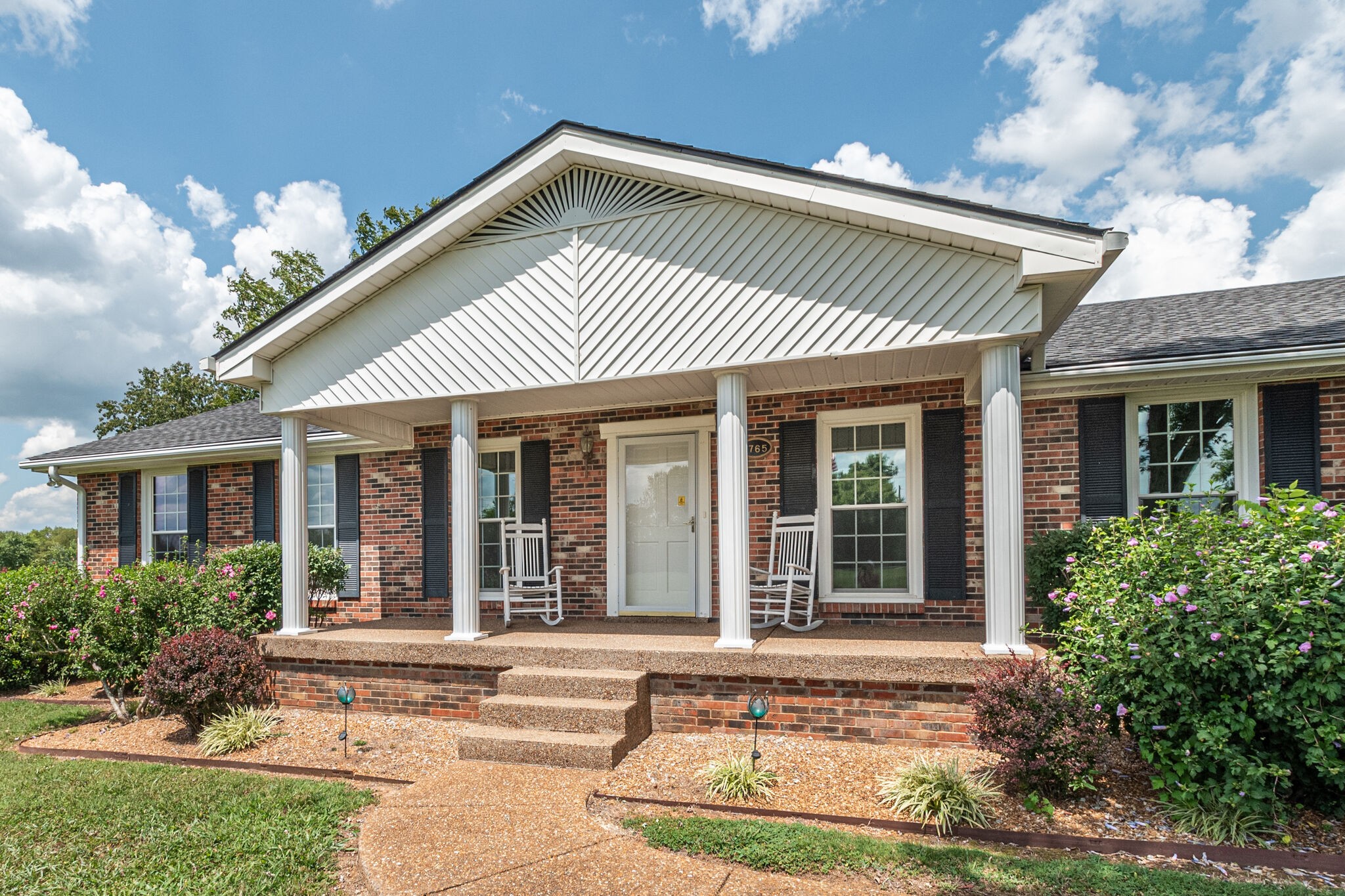 1765 Vesta Road Lebanon, TN 37090 - Photo 5 of 36 a front view of a house with a yard