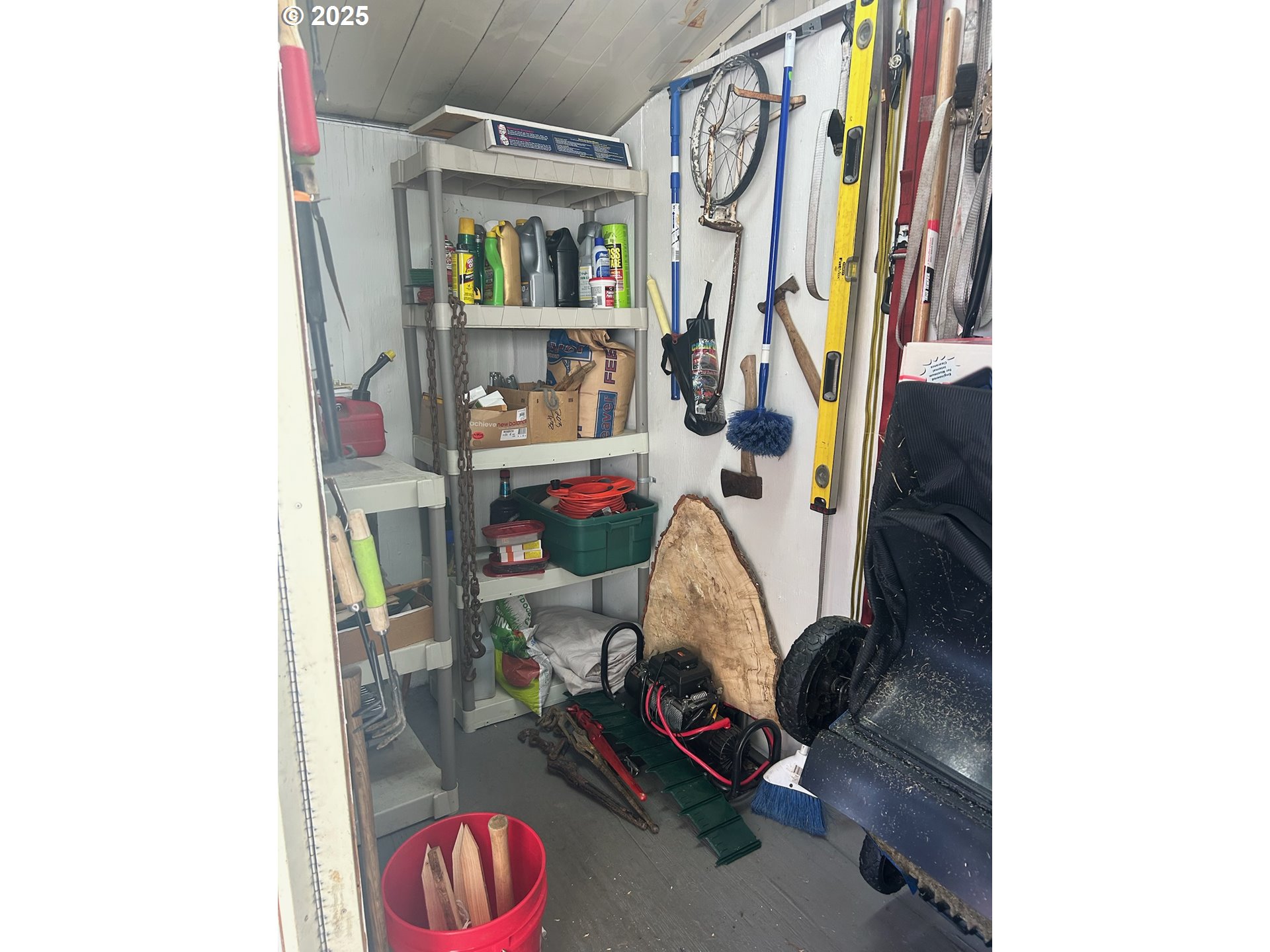 503 Southeast Sheridan Road, Unit 8 Sheridan, OR 97378 - Photo 14 of 38 a view of walk in closet with clothes and shoes