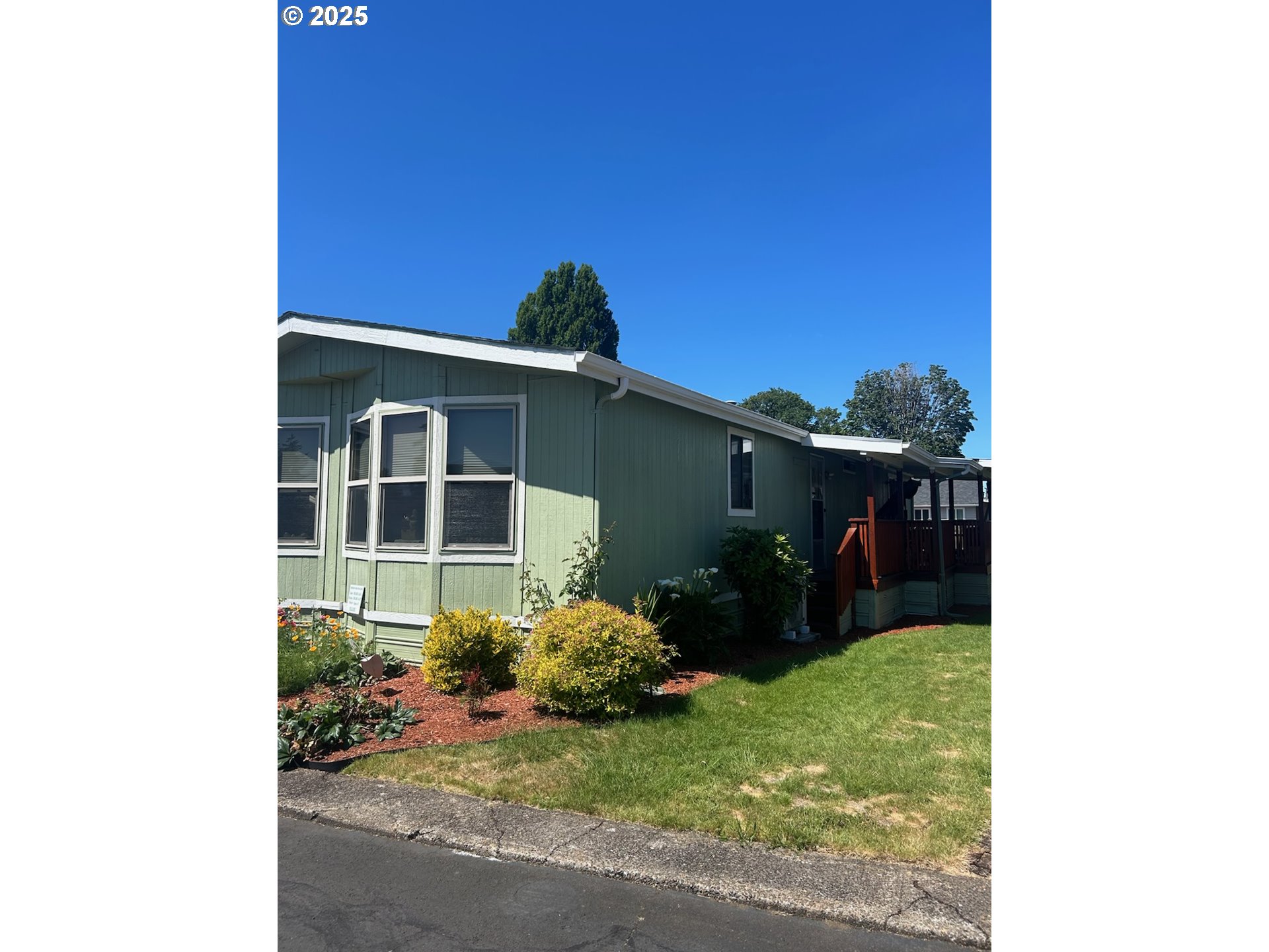 503 Southeast Sheridan Road, Unit 8 Sheridan, OR 97378 - Photo 2 of 38 a front view of a house