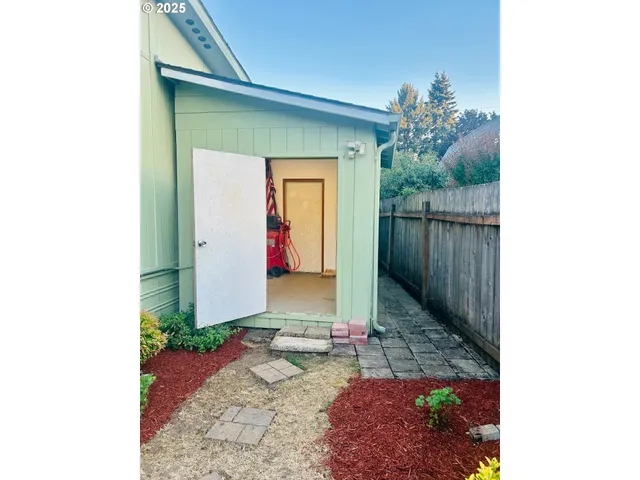 a view of room with racks on the wall