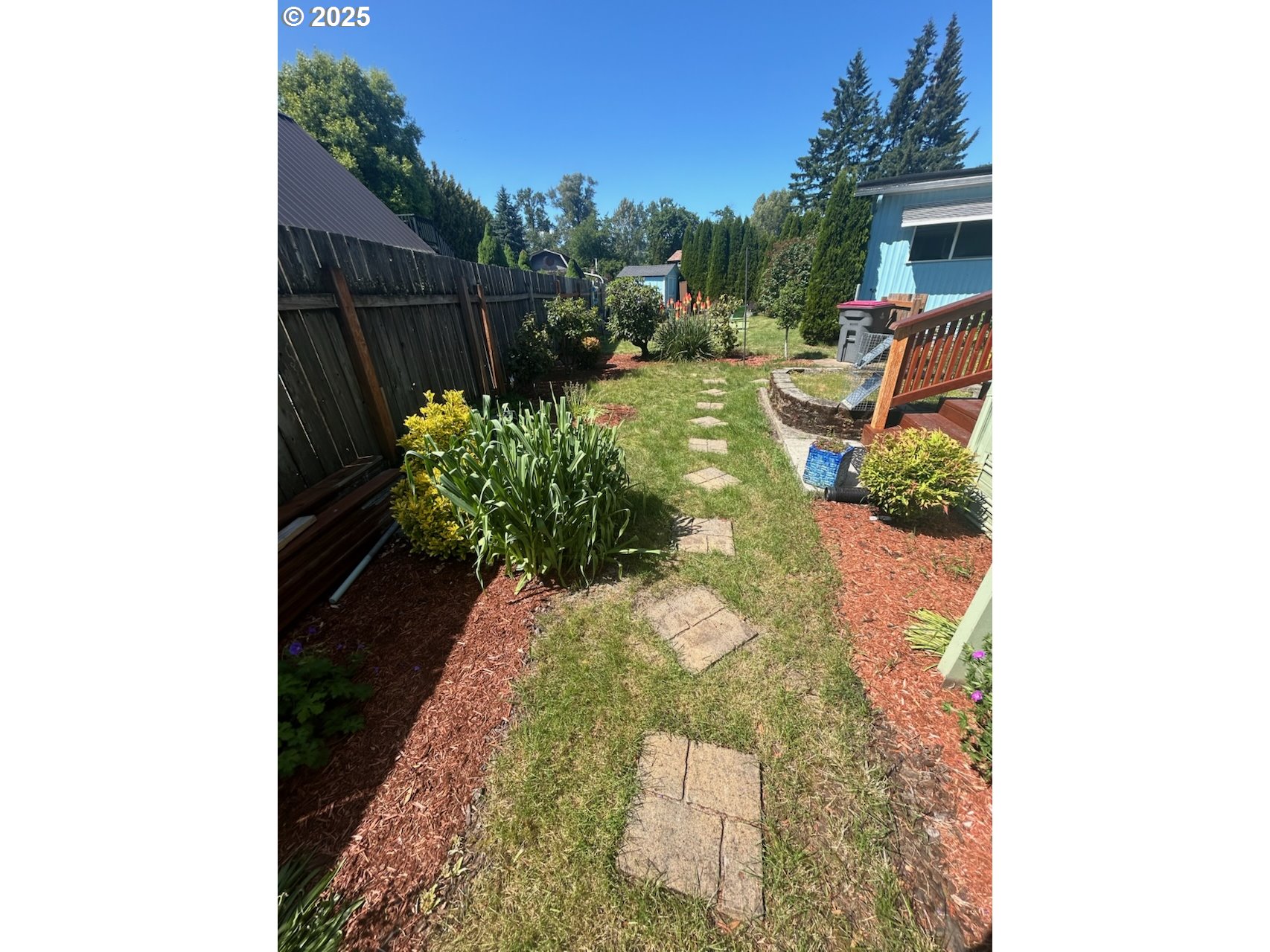 503 Southeast Sheridan Road, Unit 8 Sheridan, OR 97378 - Photo 5 of 38 a view of a backyard