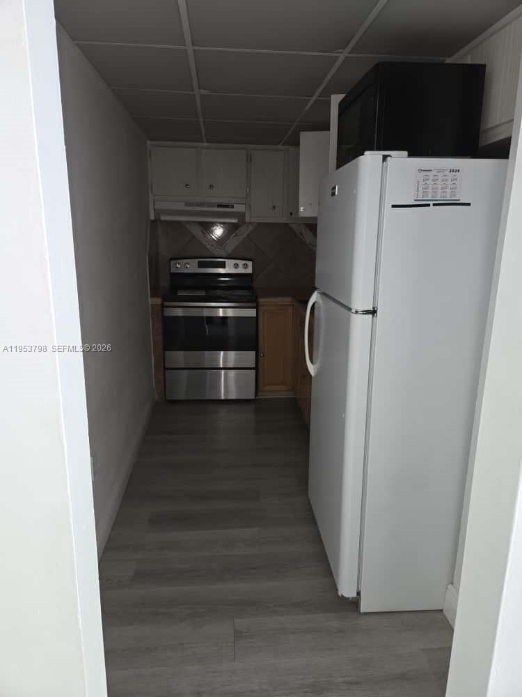 4717 Northwest 7th Street, Unit 30410 Miami, FL 33126 - Photo 5 of 8 a view of a walk in closet