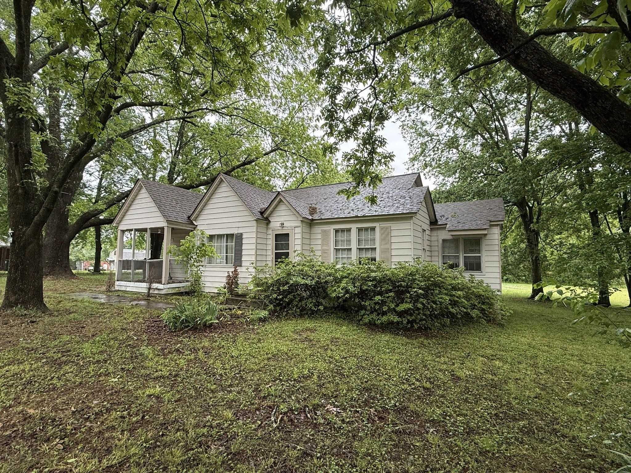 8488 Quito Road Millington, TN 38053 - Photo 28 of 30 a front view of a house with garden