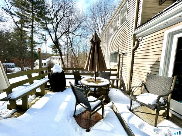 a view of a chairs and tables in the patio