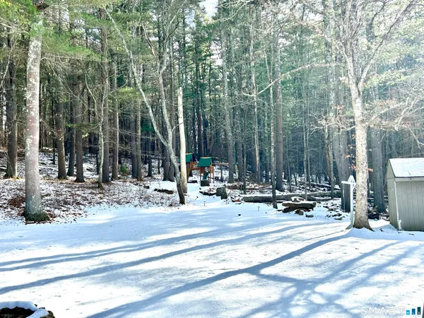 a view of street with with trees