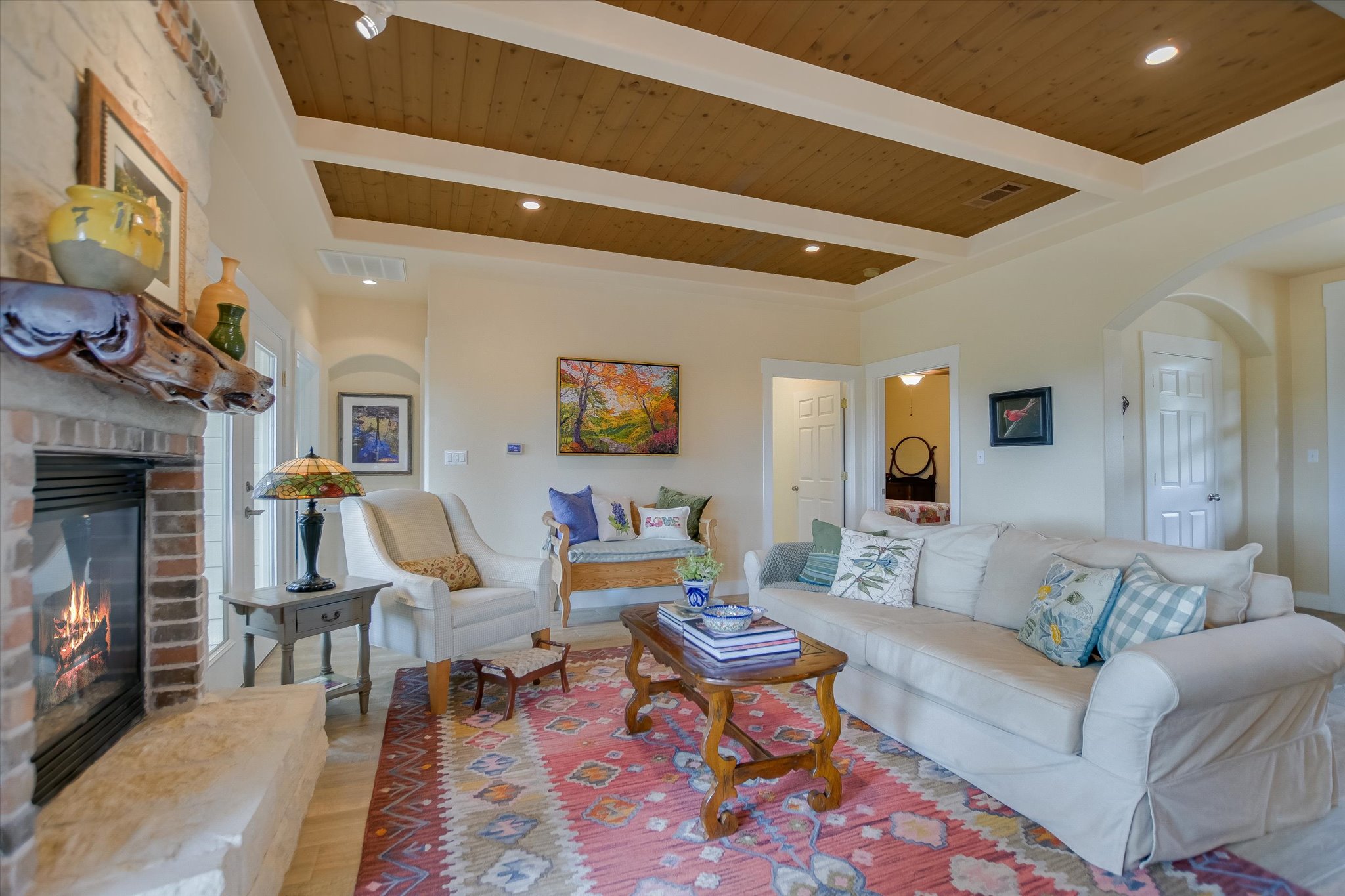 590 Rancho Grande Drive Wimberley, TX 78676 - Photo 7 of 30 a living room with furniture and a fireplace
