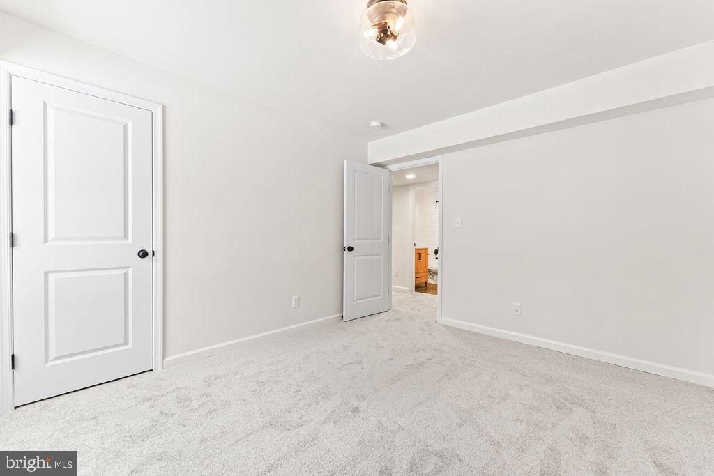 22366 Monrovia Road Orange, VA 22960 - Photo 19 of 53 an empty room with an entryway